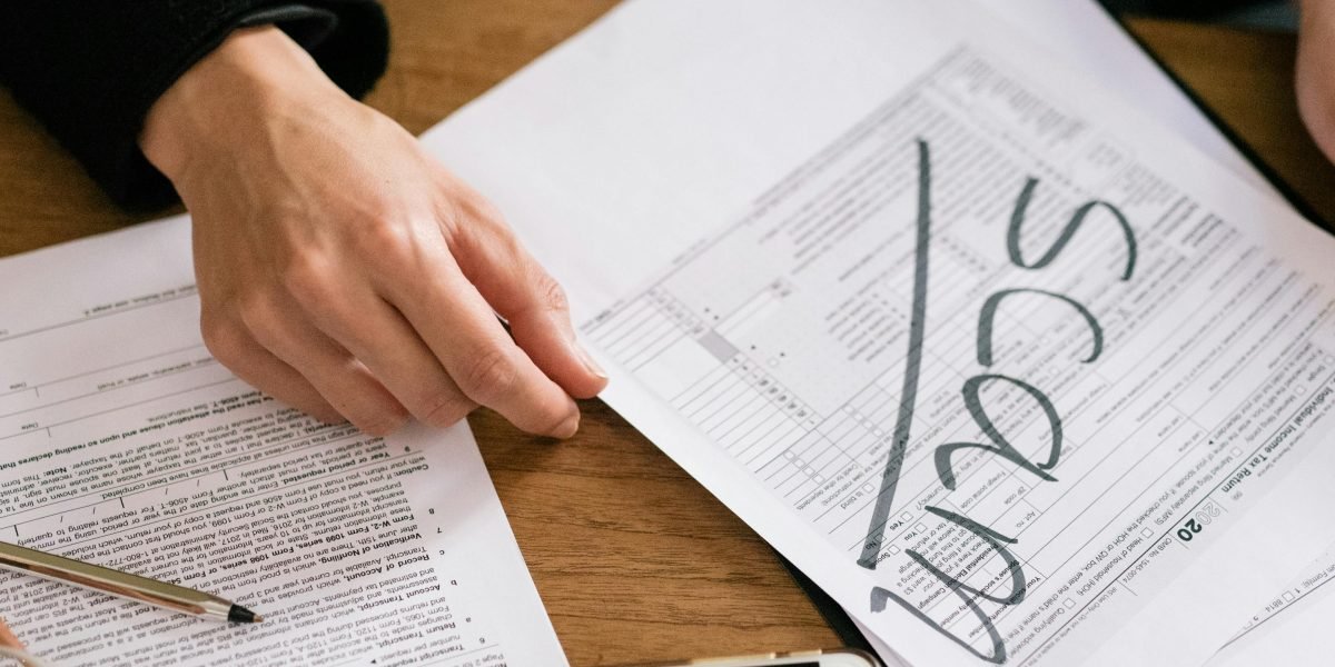 Carefully reviewing financial documents to understand potential out-of-pocket costs for healthcare services.