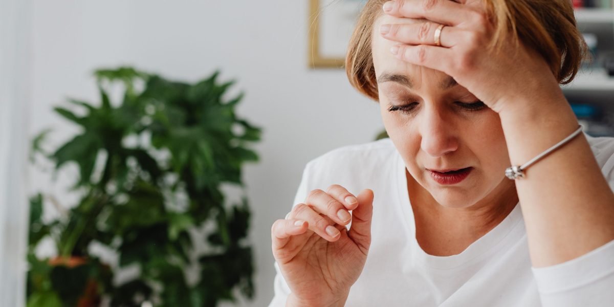 A person deep in thought, representing the common feeling of being overwhelmed and lost when seeking mental health support.