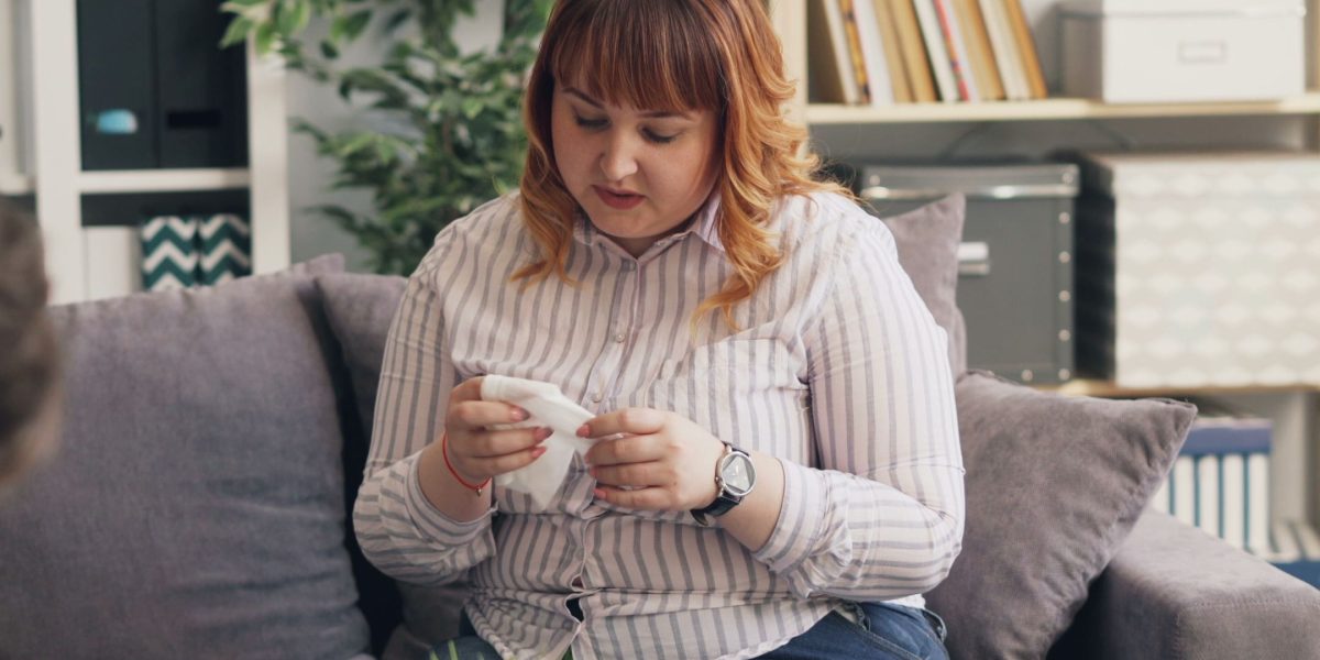A person engaging in a focused and open discussion with a mental health professional.