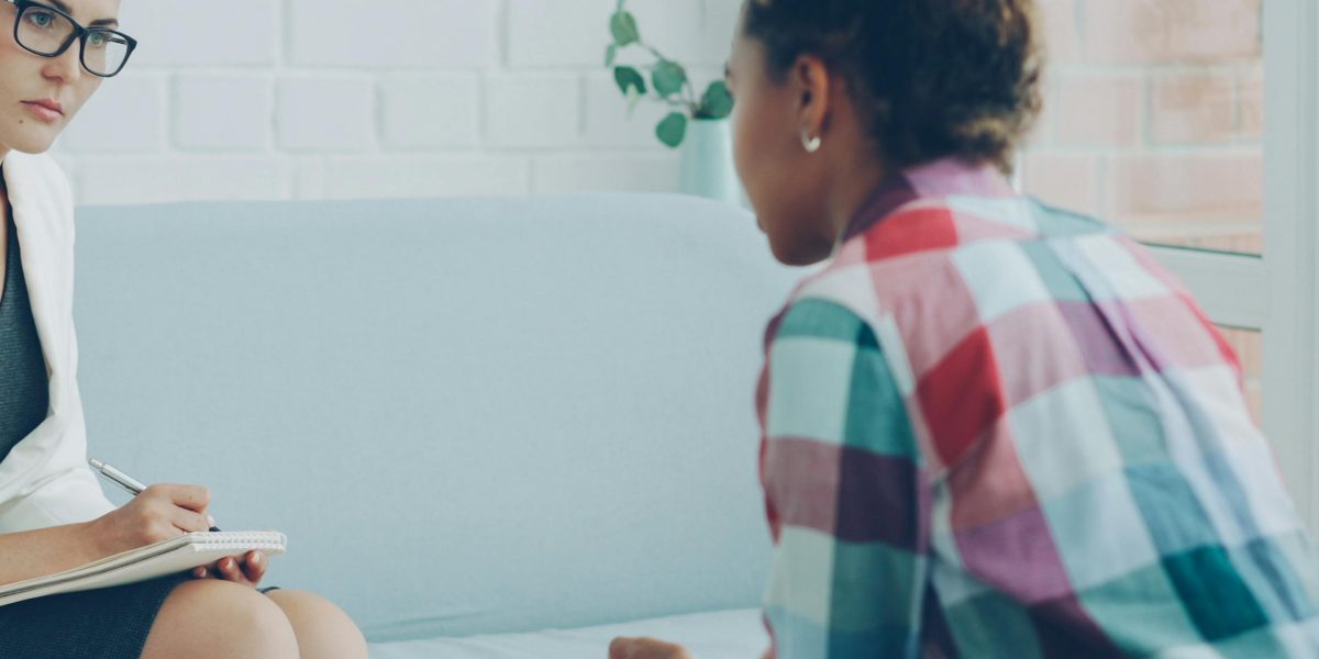 A therapist and client establishing a trusting and safe environment for open communication and emotional exploration.