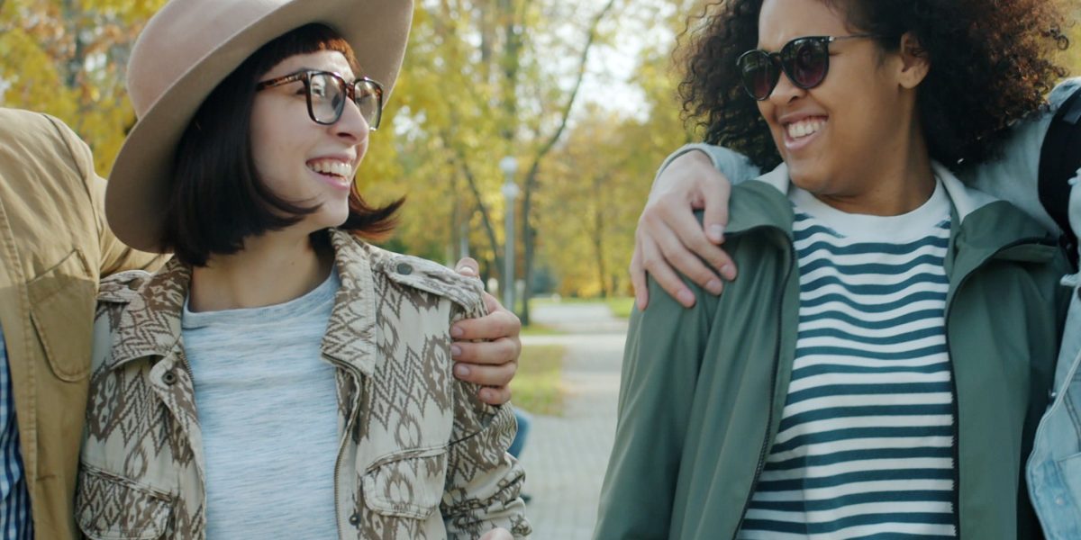 People finding relaxation and social opportunities in a vibrant park.