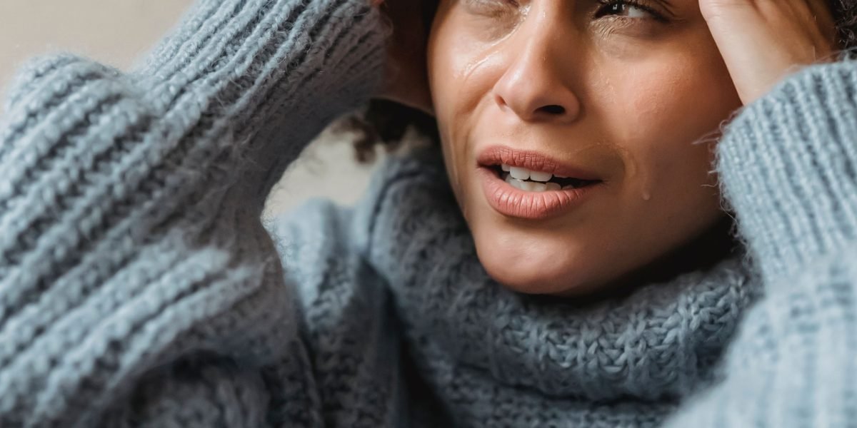 Someone looking relieved and satisfied after quickly accessing important health information through a patient portal.