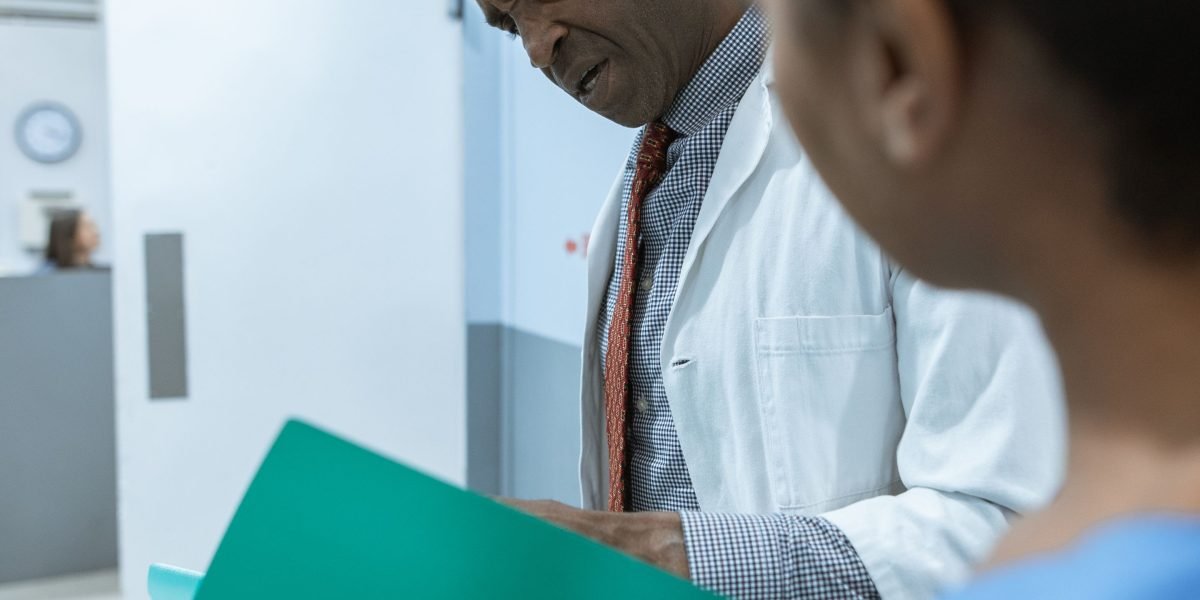 Medical professionals collaborating, symbolizing the integrated care model where mind and body are treated together.
