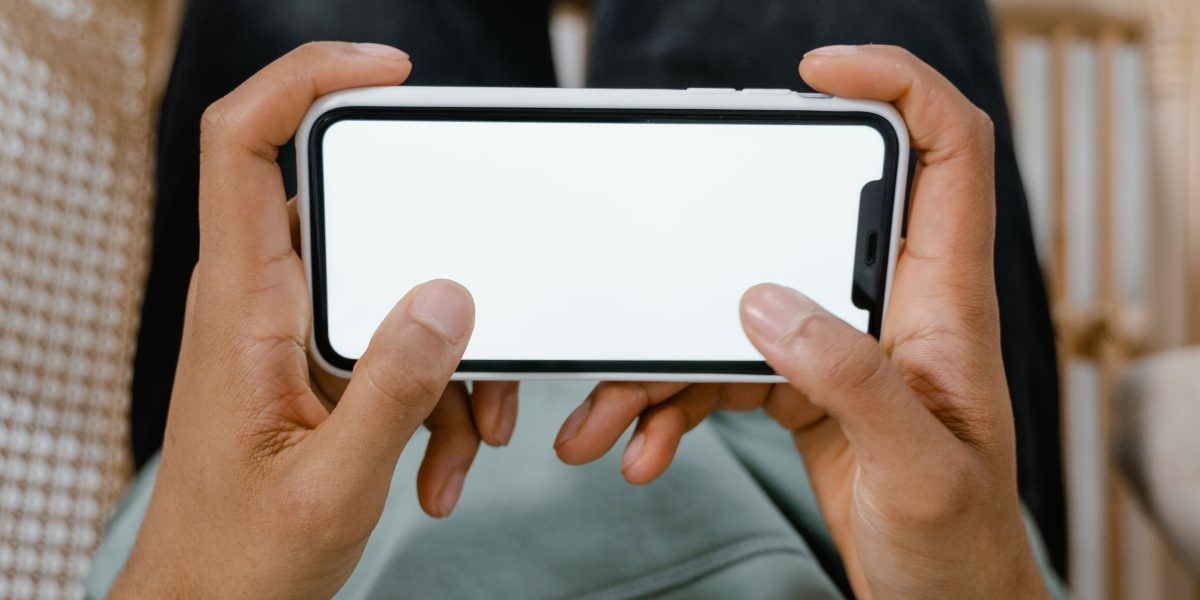 A person comfortably engaging with a digital device, representing accessible mental health support through technology.