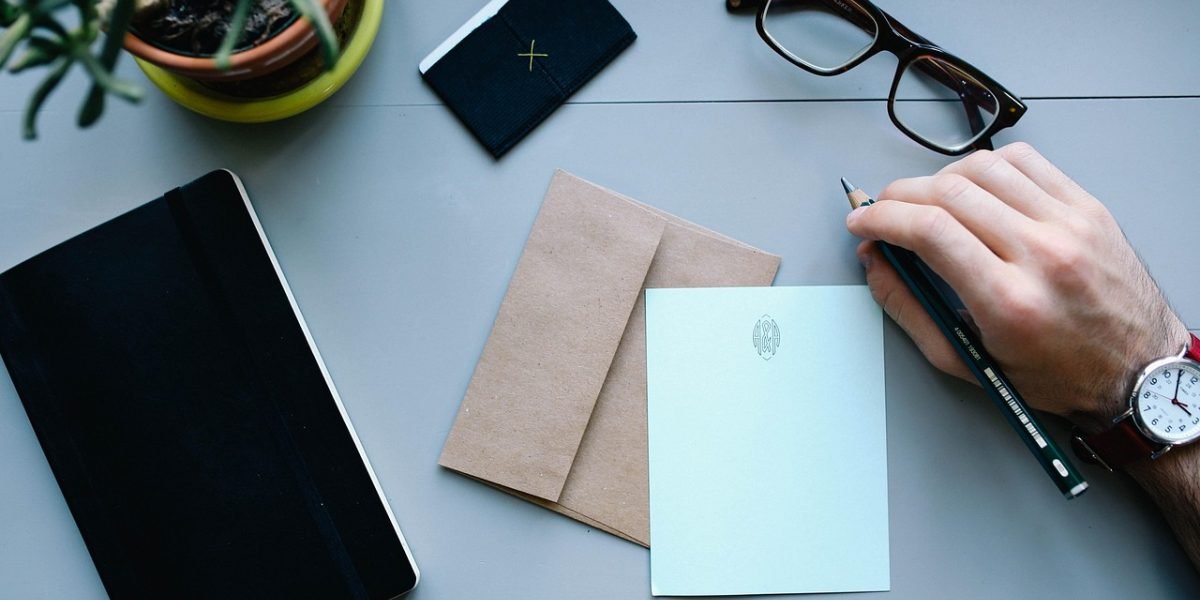 A person diligently reviewing paperwork, symbolizing the importance of clear health documentation.