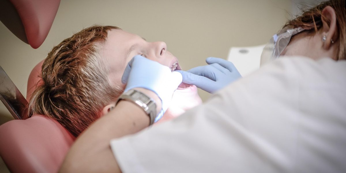 A skilled clinician engages in a detailed discussion to understand a patient's full history and experiences for an accurate assessment.