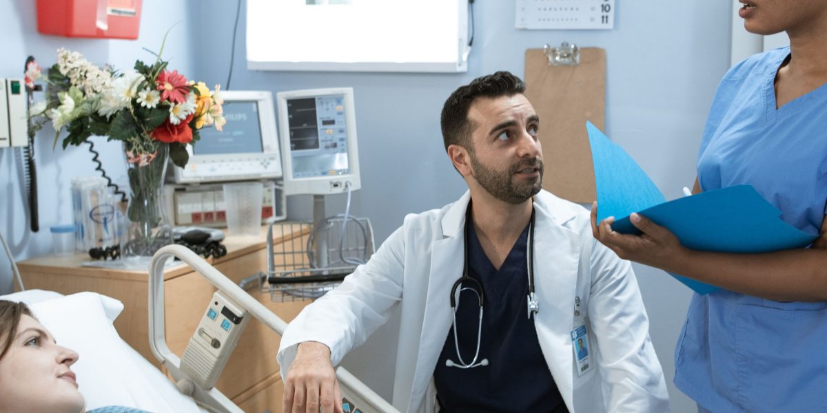 A patient actively participates in a discussion with their healthcare team, fostering collaborative care.
